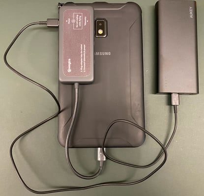tablet connected to power bank